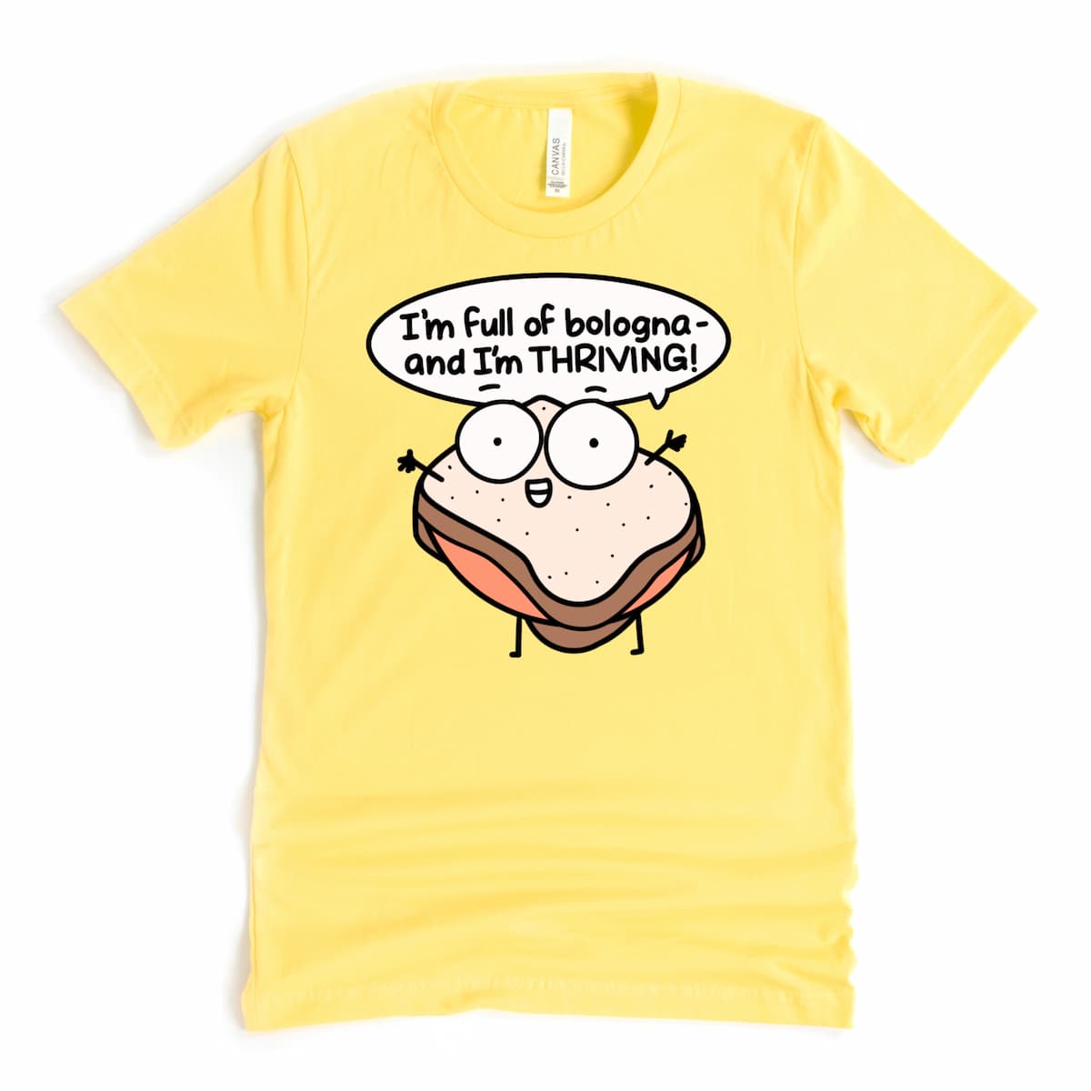 Yellow t-shirt with playful cartoon bologna sandwich and words “I’m Full of Bologna and I’m Thriving,” silly humor shirt by Kalirally