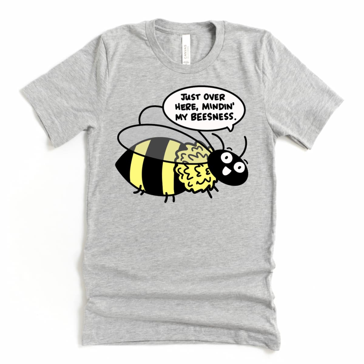 Athletic grey t-shirt featuring cartoon bee and text “Just Over Here Minding My Beesness,” playful pun graphic tee by Kalirally