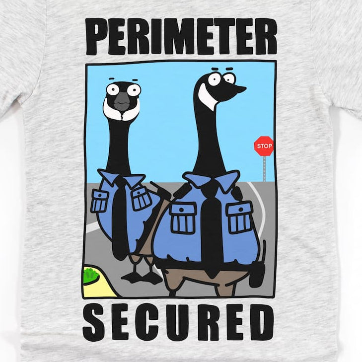 Close-up of Heather Ash Funny Goose Shirt showing Canadian geese in uniforms with “Perimeter Secured” text by Kalirally