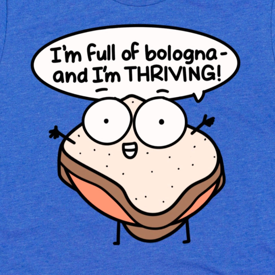 Close-up of cartoon bologna sandwich graphic and phrase “I’m Full of Bologna and I’m Thriving” on heather royal blue t-shirt, funny food graphic tee by Kalirally