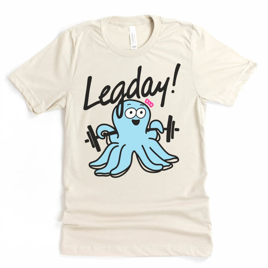 Flat lay of Heather Dust shirt with cartoon octopus on leg day – cute workout shirt by Kalirally