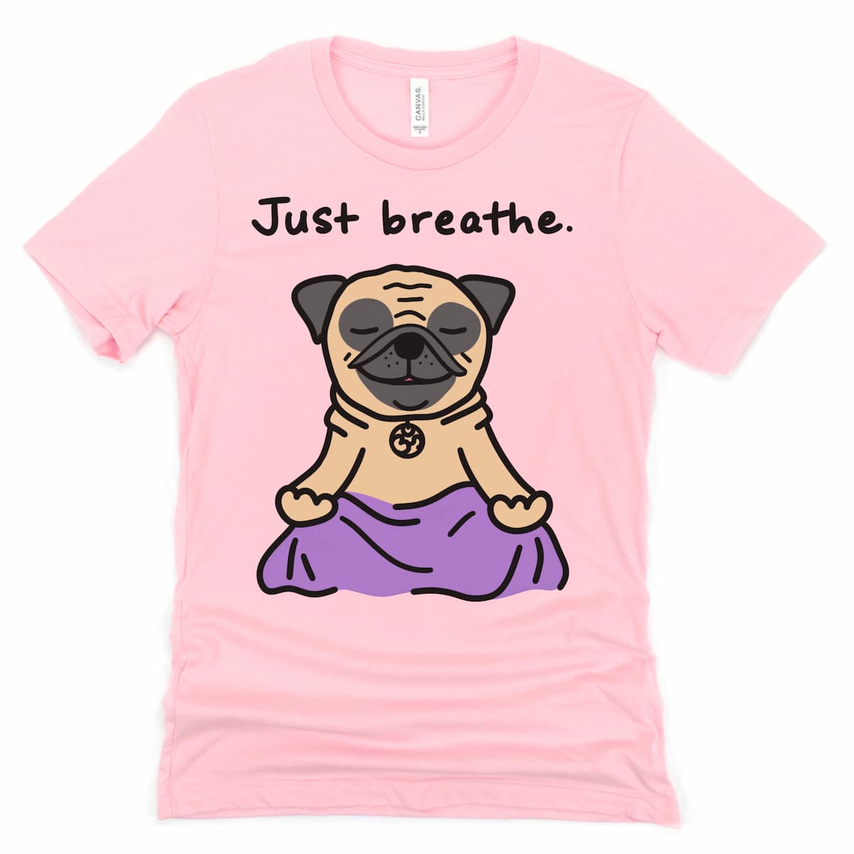 Pink tee with a calm cartoon pug in a seated pose and “Just Breathe” – cute pug tee flat lay from Kalirally