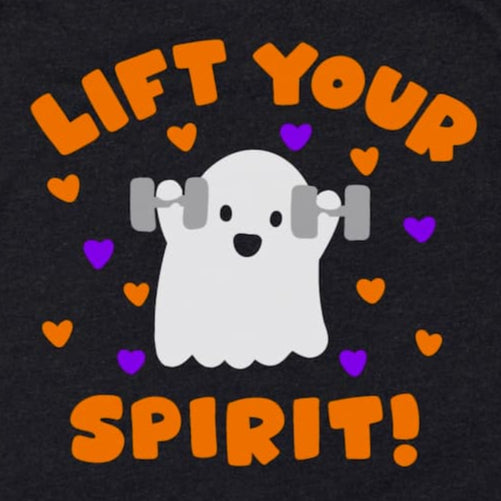 A Close up of the Lift your spirit! Weightlifting Shirt design on Heather black - a happy ghost lifting weights with little orange and purple hearts around.
