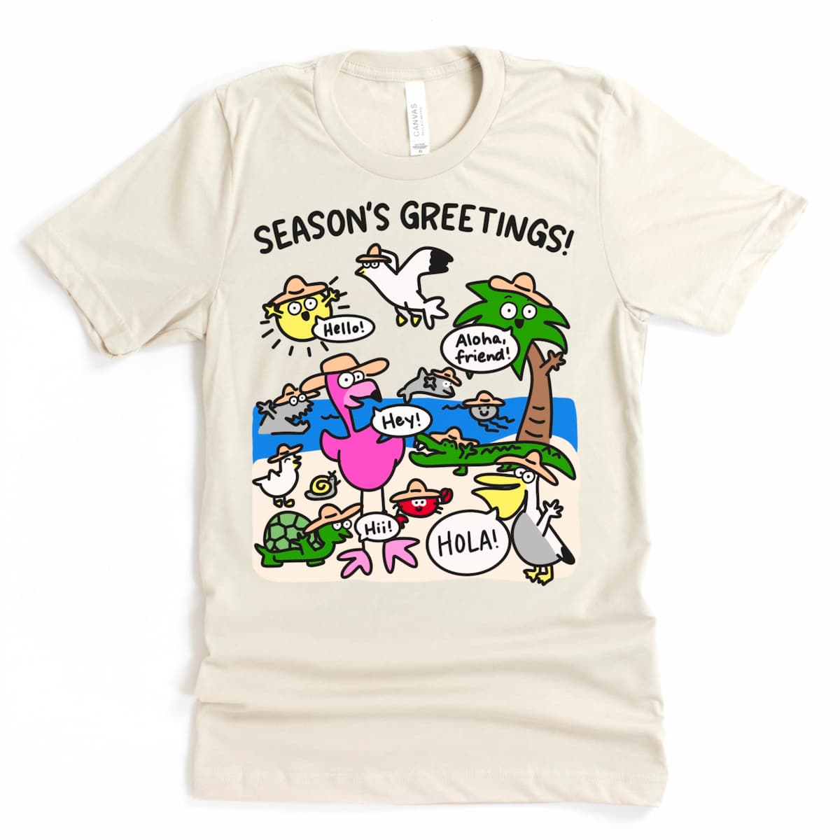 Kalirally’s Florida beach shirt in soft heather dust color, laid flat to show a whimsical “Season’s Greetings” graphic with beach-loving animals.