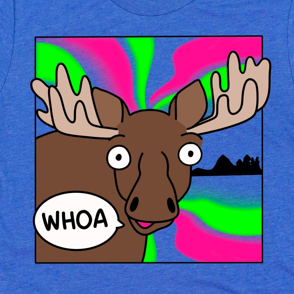 Close-up of cartoon moose saying “WHOA” under colorful northern lights on heather royal blue shirt Kalirally