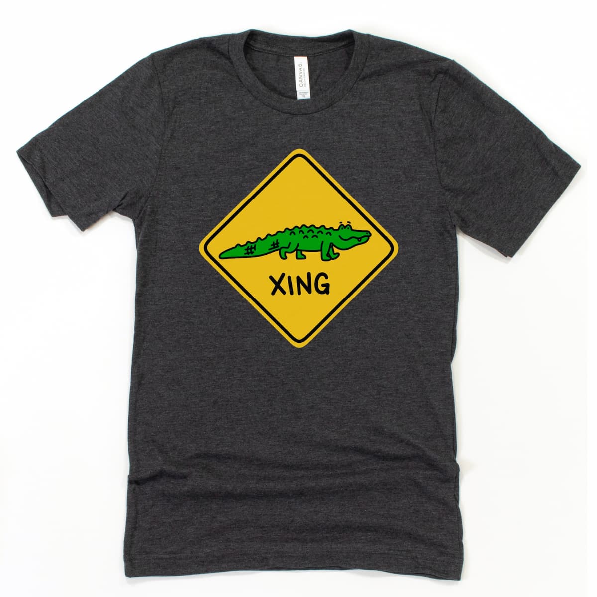 Playful Cartoon Alligator Crossing Shirt in Heather Dark Grey with gator XING design, by Kalirally