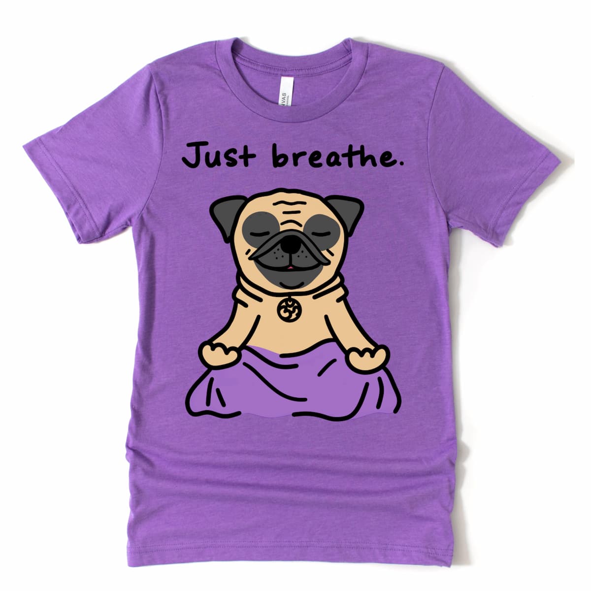 Heather Team Purple shirt featuring meditating cartoon pug and “Just Breathe” quote – pug tee shirt flat lay by Kalirally