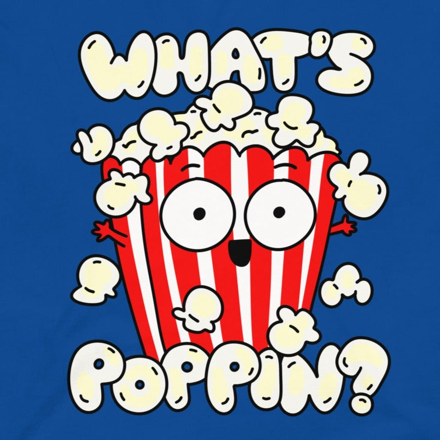 Get a poppin' look with our "What's Poppin?!" Popcorn T-Shirt in Royal Blue, up close. Made with high-quality fabric, this shirt features a fun and quirky design that's sure to turn heads. Perfect for movie nights, parties, or just a casual day out. Keep it poppin' with this must-have shirt!