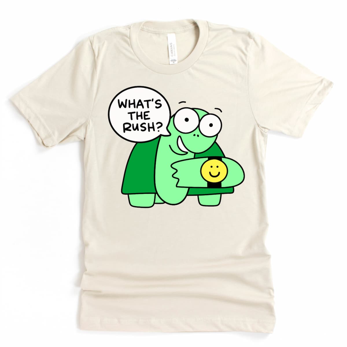 Soft Heather Dust tee with cheerful cartoon turtle and “What’s the Rush?” message for slow-living vibes