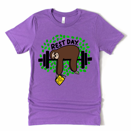 Funny sloth gym rest day t-shirt in Heather Team Purple, cartoon sloth lounging with book – gym graphic tees women's