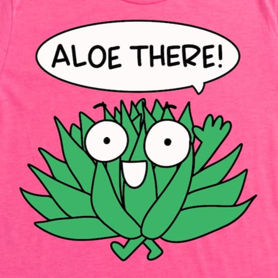 A close up image of a Playful aloe plant cartoon shirt with “Aloe there!” design in Heather Charity Pink by Kalirally