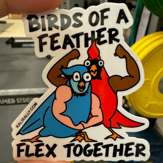 A photo of a 3x3" vinyl glossy sticker with two cartoon birds flexing and text, "Birds of a feather flex together!" by Kalirally