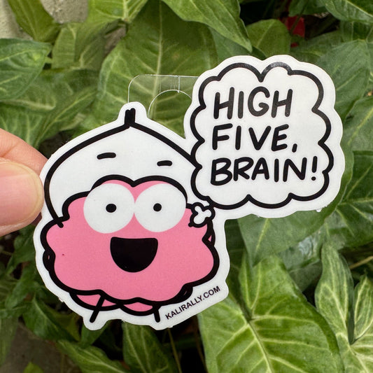 Cartoon brain sticker giving itself a high five with the phrase "High Five, Brain!" Funny vinyl STEM sticker for water bottles, laptops, and notebooks, by Kalirally.