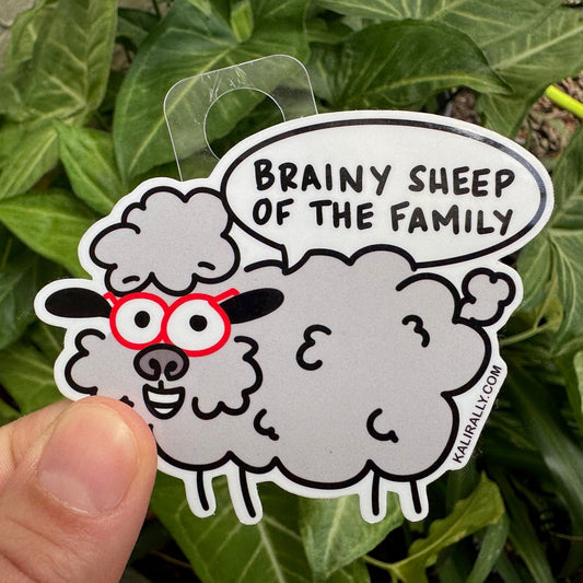 Brainy Sheep Sticker with cartoon sheep and phrase “Brainy sheep of the family,” nerdy fun decal by Kalirally.