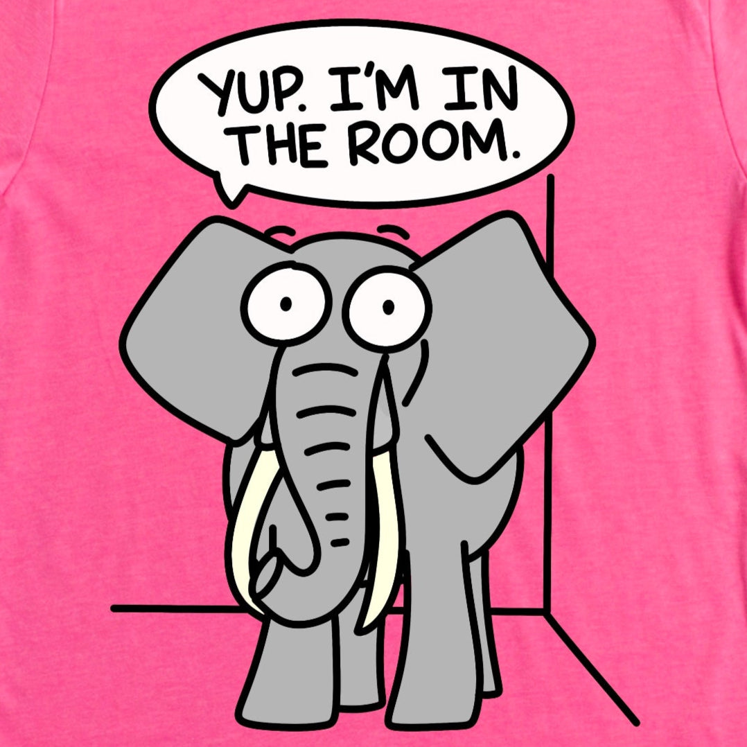 Close-up of Elephant in the Room Shirt in Heather Charity Pink showing cartoon elephant with phrase “Yup. I’m in the room,” by Kalirally