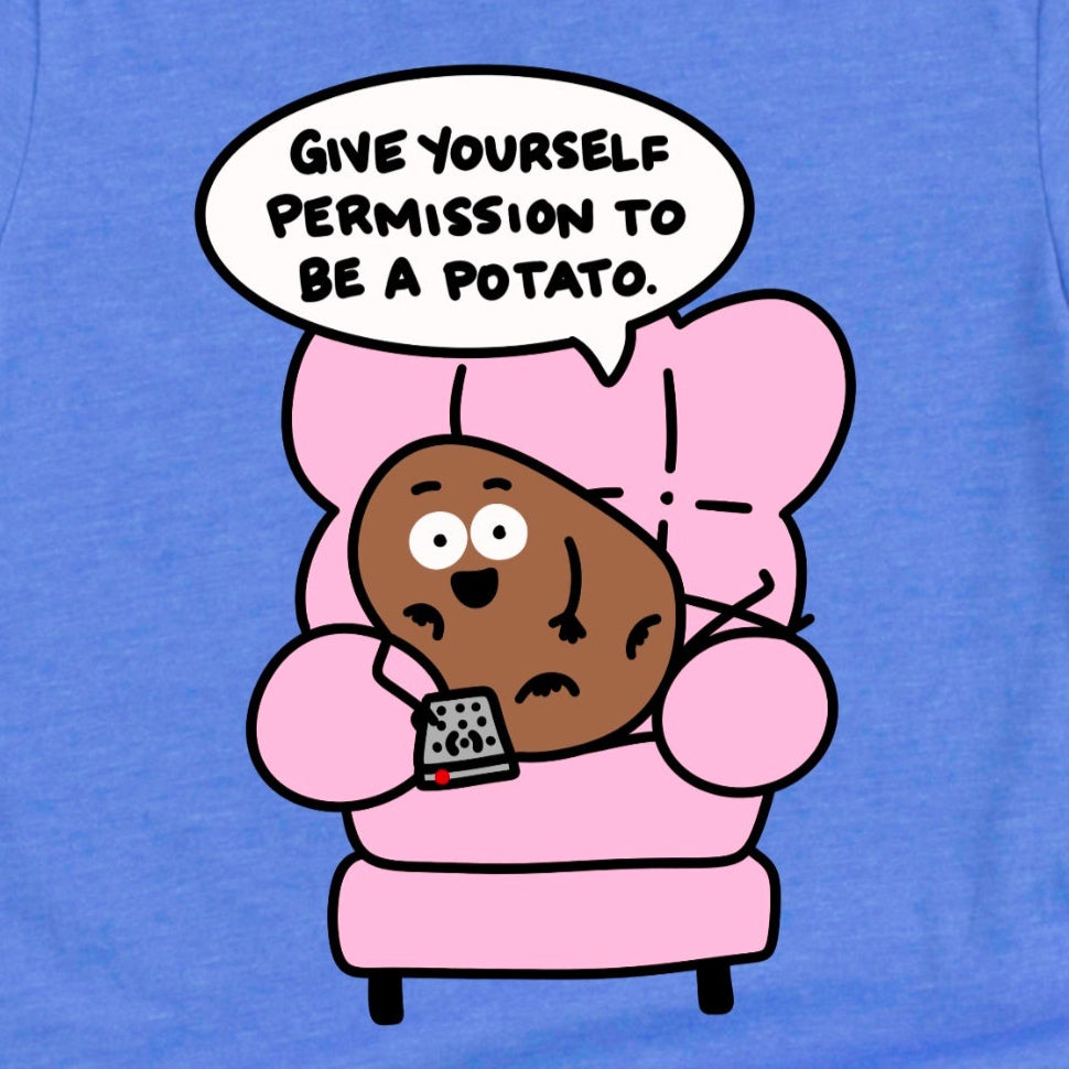 Close-up of Self Care Shirt design in Heather Columbia Blue showing potato in recliner and “Give yourself permission to be a potato” phrase, by Kalirally