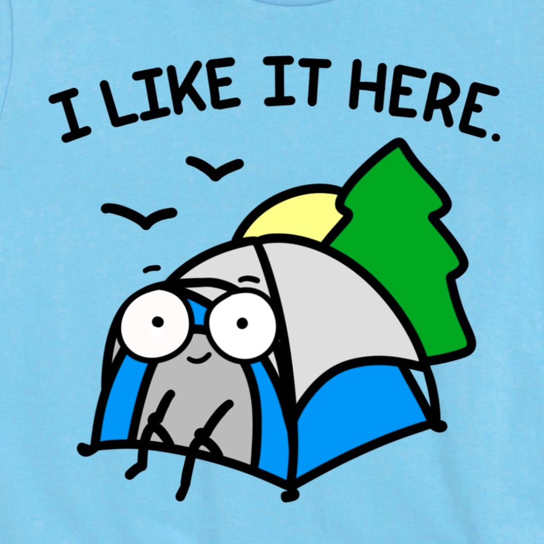 Close-up of Solitude Camping Shirt design in Ocean Blue showing tent graphic and text “I like it here,” by Kalirally