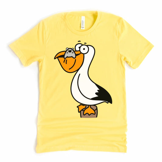 Yellow coastal t shirt with quirky pelican and shark illustration – bold summer shirt by Kalirally