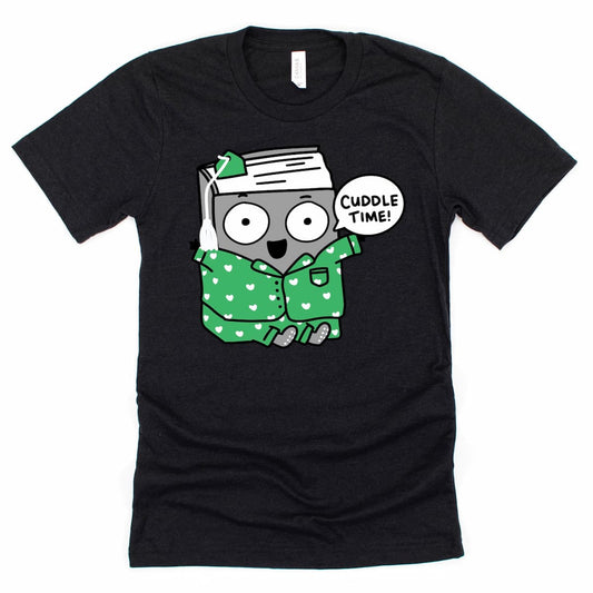 Cozy Bookish Shirt in Heather Black, featuring a cartoon book in patterned pajamas saying “Cuddle time!”, by Kalirally