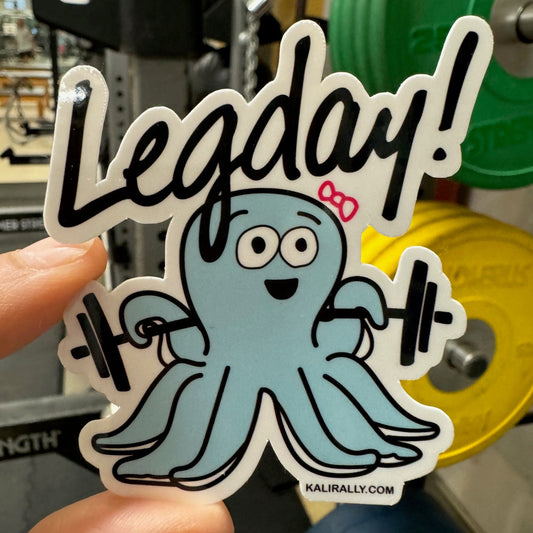 Cute 3x3 vinyl sticker of an Octopus with a Barbell with "Legday!" written overhead, by Kalirally