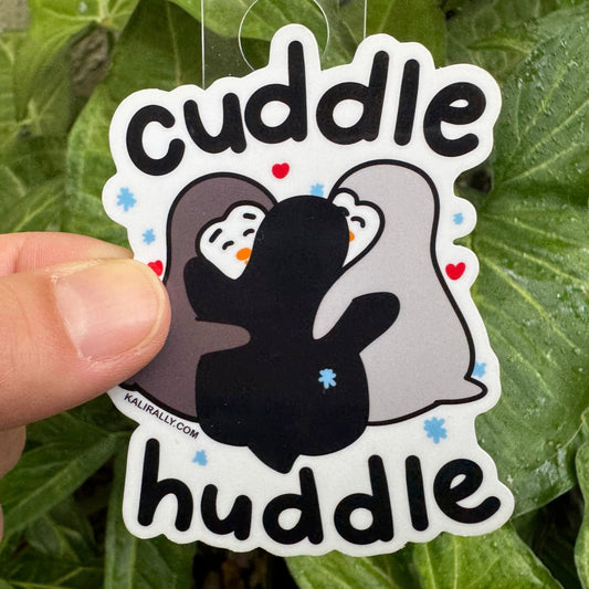 A picture of a 3x3" vinyl Cute Penguin Sticker – "Cuddle Huddle" Cartoon Decal by Kalirally