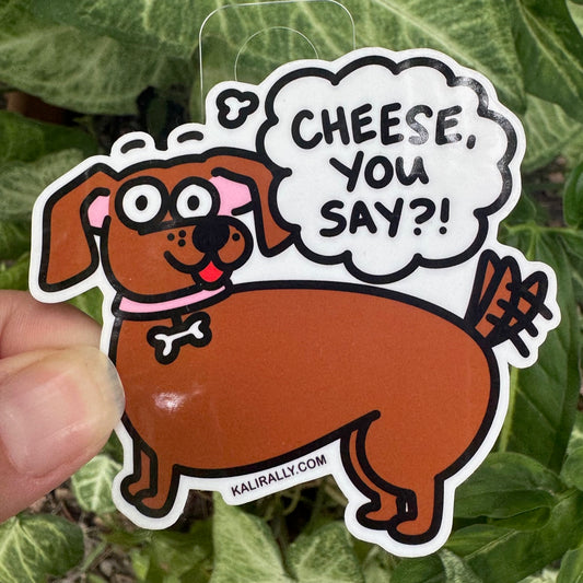 Dachshund Sticker featuring a funny cartoon wiener dog with the phrase “Cheese you say?!” playful dog decal by Kalirally