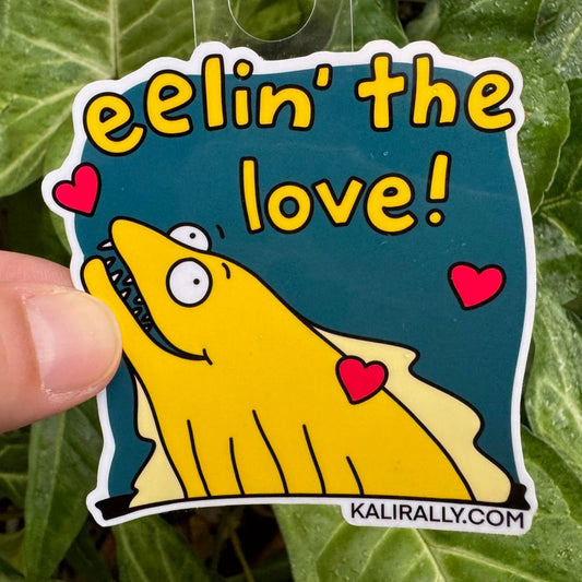 Eel Sticker with a cute cartoon eel and the phrase “Eelin’ the love!” silly ocean-themed decal by Kalirally.