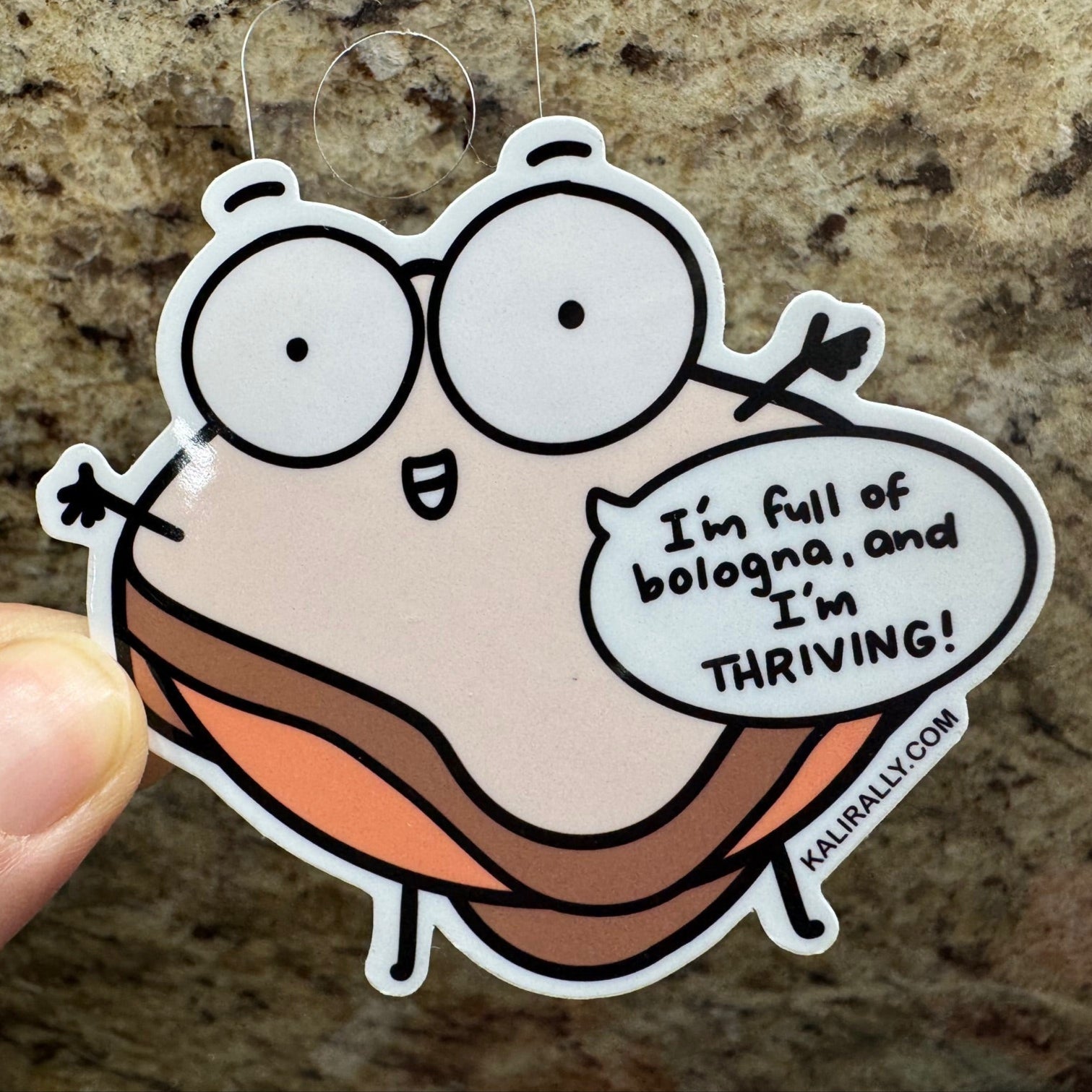 Full of Bologna Sticker by Kalirally featuring a cartoon bologna sandwich and playful text, waterproof vinyl water bottle sticker for pun lovers and food humor fans.