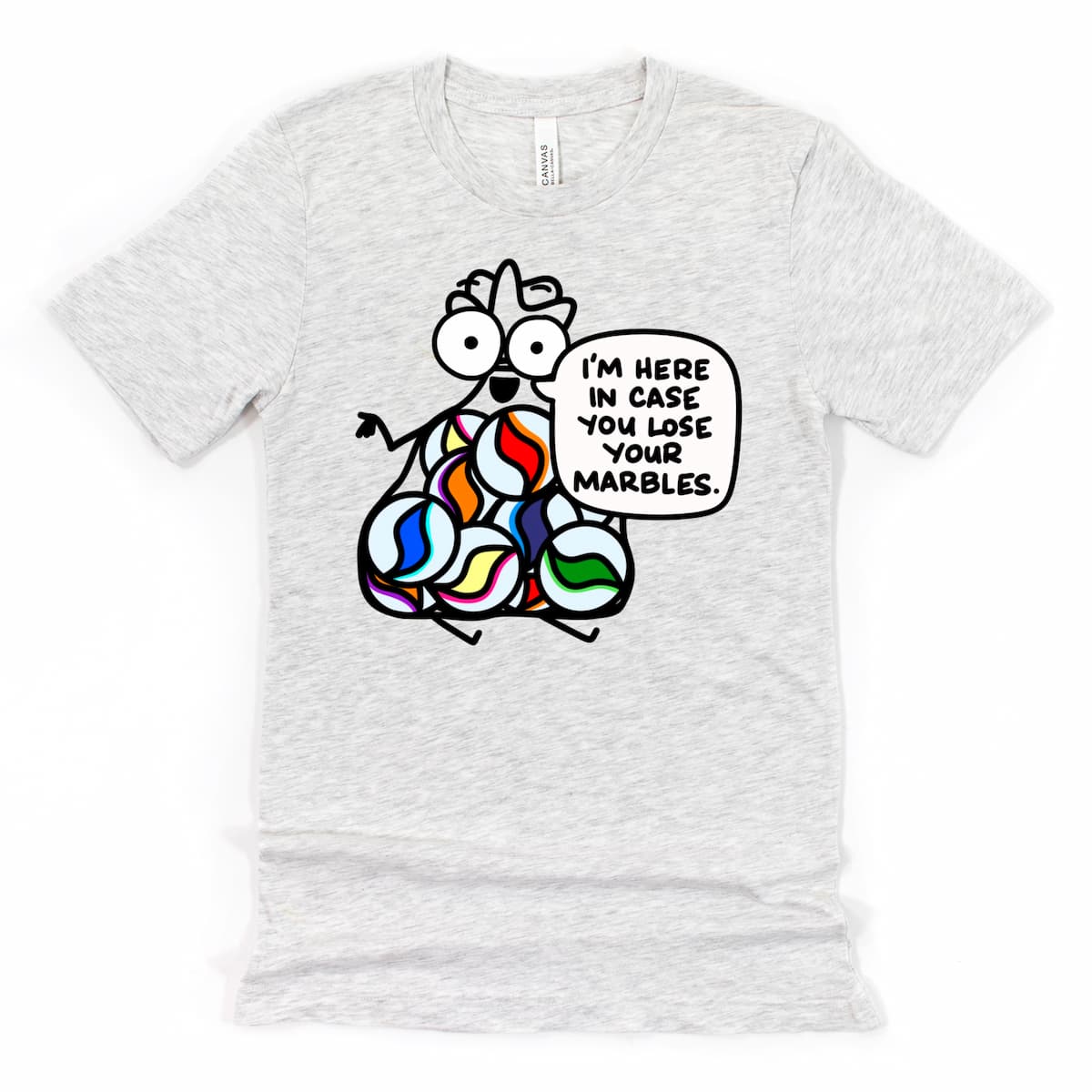 Heather Ash Fun Coworker Shirt with cartoon bag of marbles saying “I’m here in case you lose your marbles,” by Kalirally