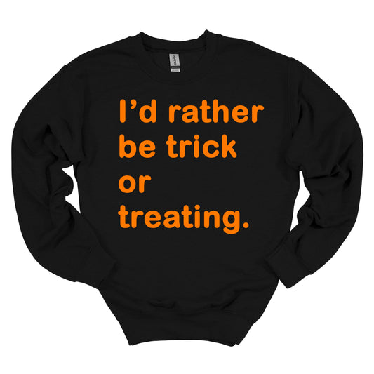 Black crewneck Halloween sweatshirt with “I’d Rather Be Trick or Treating” text in festive orange font, fun spooky season sweatshirt by Kalirally