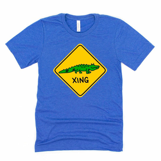 Funny Alligator Crossing Shirt in Heather True Royal Blue featuring a cartoon gator XING design, by Kalirally
