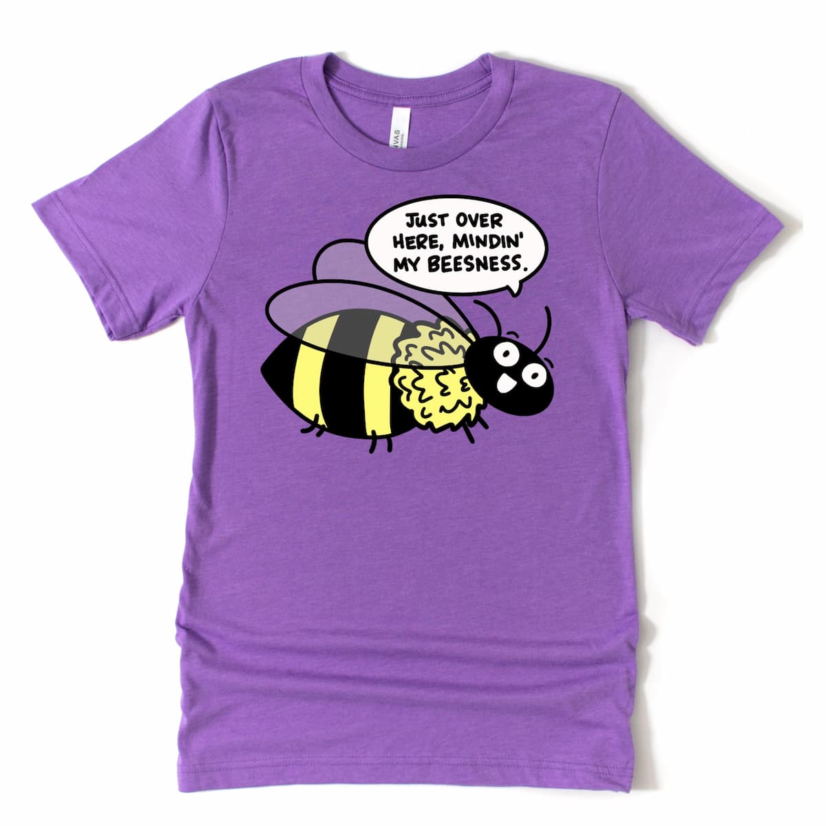 Heather purple t-shirt with cartoon bee and text “Just Over Here Minding My Beesness,” humorous pun graphic tee by Kalirally
