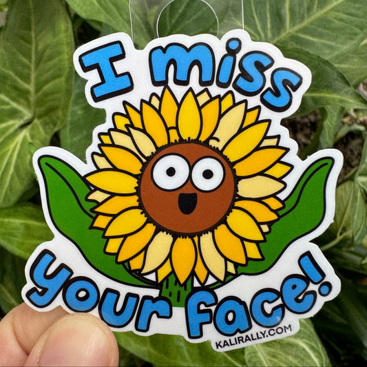 Funny Long Distance Sticker by Kalirally featuring a smiling cartoon sunflower and “I Miss Your Face!” text, glossy vinyl water bottle sticker, perfect for laptops, bottles, notebooks, and gifts.