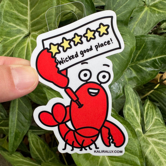 Cartoon lobster sticker with the phrase "Wicked Good Place!" Funny vinyl decal for water bottles, laptops, notebooks, and New England fans.