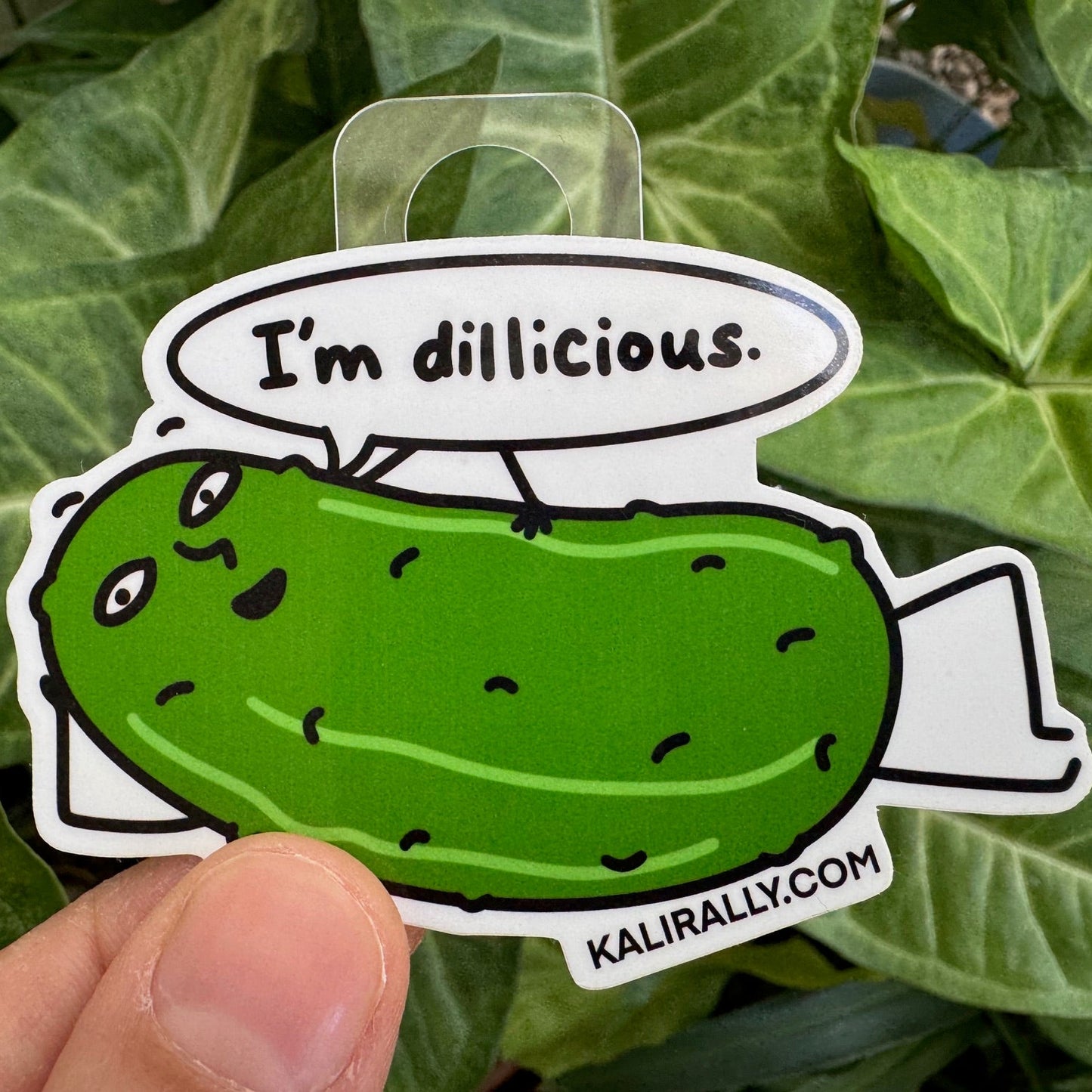Funny Pickle Sticker by Kalirally featuring a smiling cartoon dill pickle with “I’m Dillicious” text. Waterproof vinyl water bottle sticker for food humor fans.