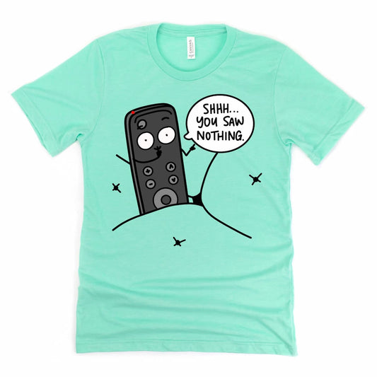Funny Remote Control Shirt in Heather Mint Green featuring cartoon TV remote hiding and saying “Shhh, You Saw Nothing” phrase, by Kalirally.