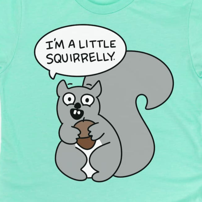 Zoomed in image of Cartoon Squirrel Shirt that says, "I'm a little squirrelly" on heather mint green, by Kalirally