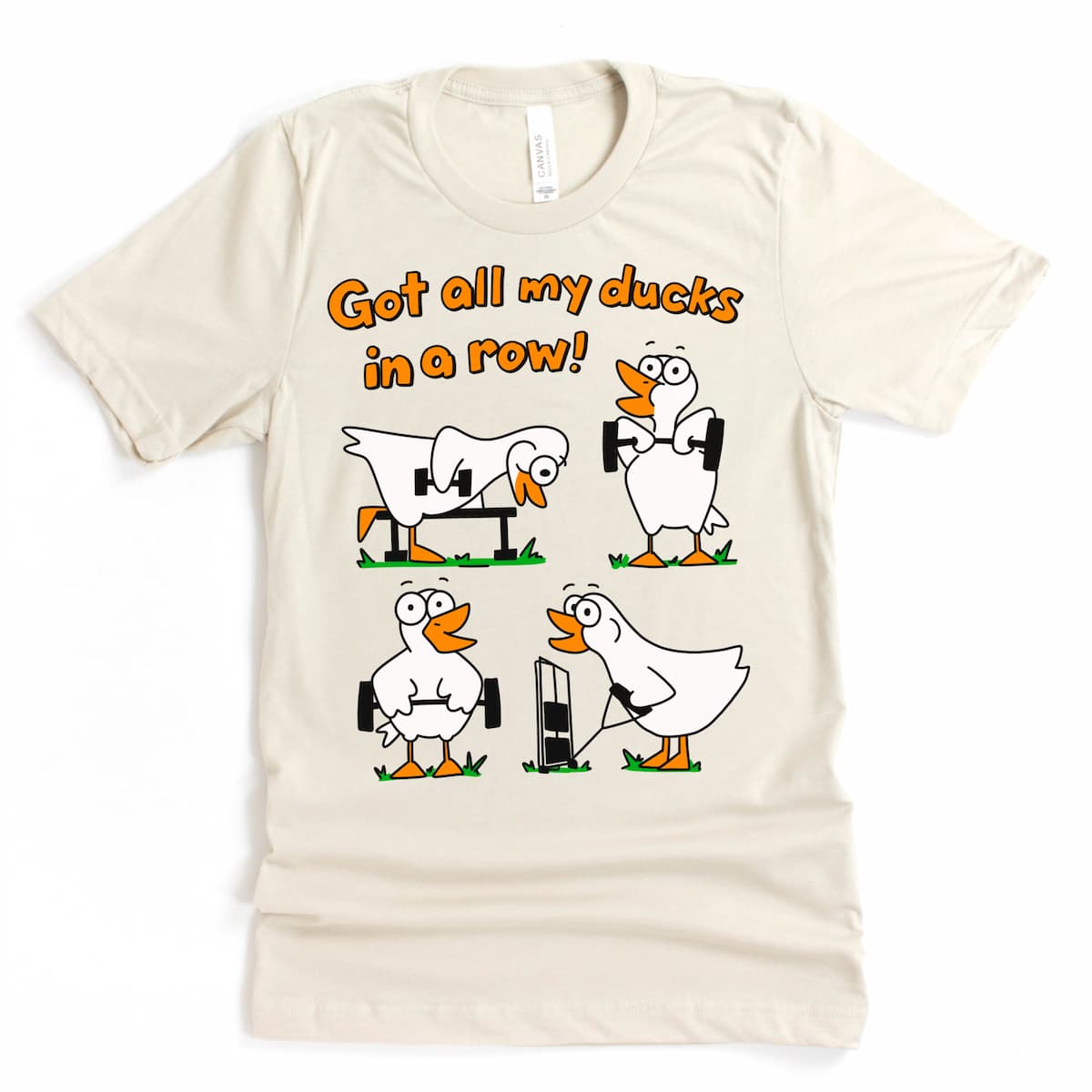 Cartoon duck gym shirt flat lay in Heather Dust on Bella + Canvas 3001 tee
