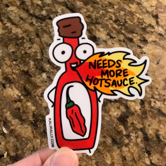 Hot Sauce Sticker with cartoon hot sauce bottle and phrase “Needs more hotsauce!”, funny spicy food decal by Kalirally