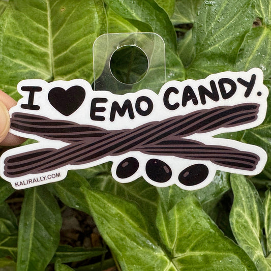Cartoon black licorice and jelly beans sticker with text “I love emo candy” — funny candy decal for laptops, water bottles, and more by Kalirally.