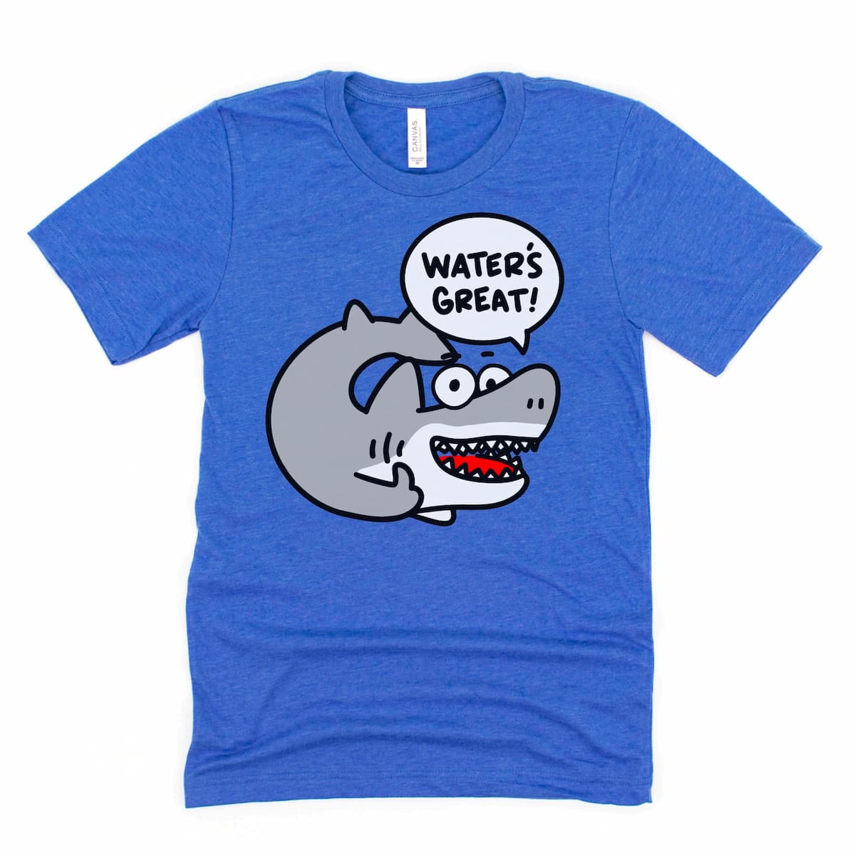 Flat lay of Kalirally shark tee in heather true royal blue featuring a grinning cartoon shark with text that reads “Water’s great!”