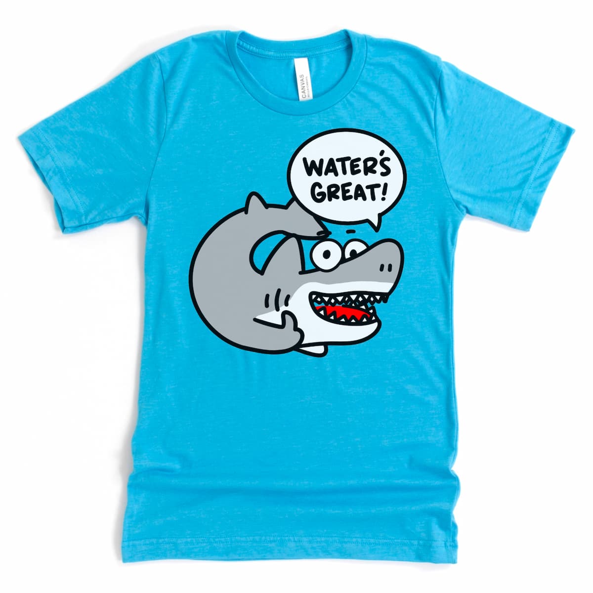Kalirally’s heather aqua shark t shirt with a joyful cartoon shark yelling “Water’s great!” – flat lay of quirky ocean-themed tee.