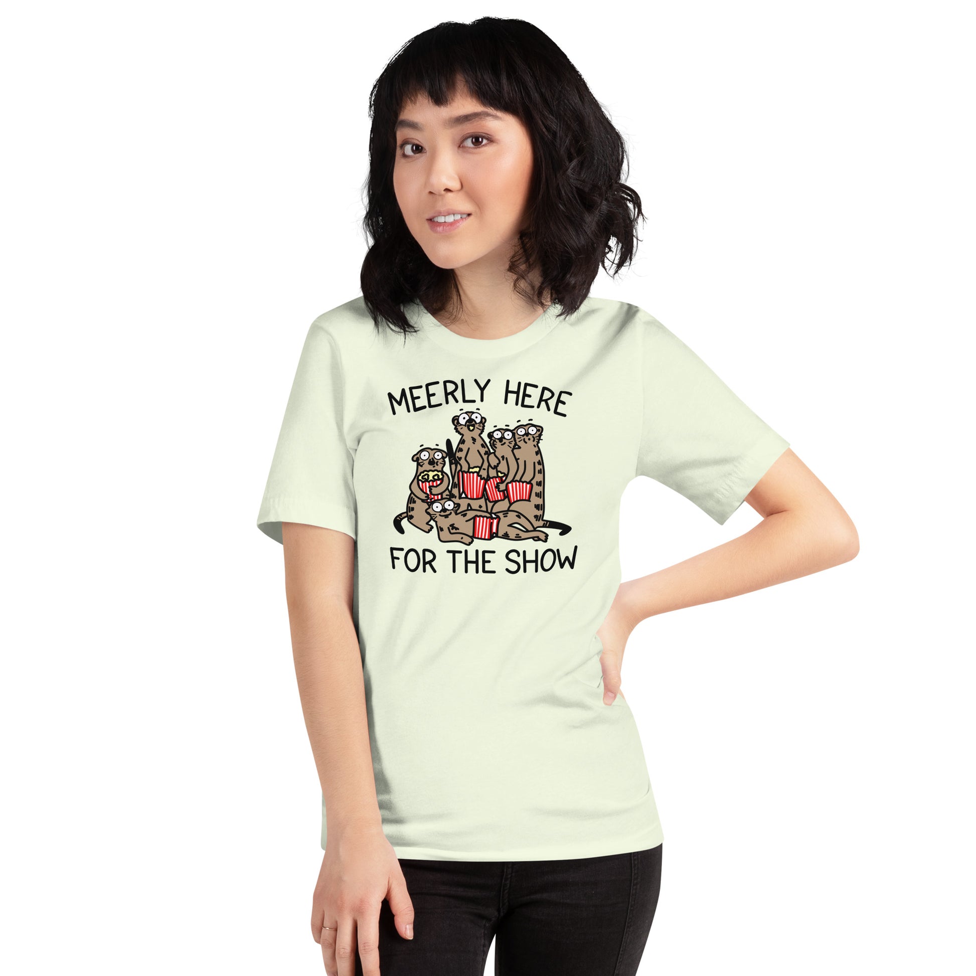 Unleash your inner animal lover with our Meerly Here for the Show t-shirt! Featuring a mob of meerkats with popcorn in hand, this meme shirt is perfect for teachers, nurses, and anyone who loves a good drama. Universally relatable and sure to make a statement, this shirt is a must-have for your wardrobe!