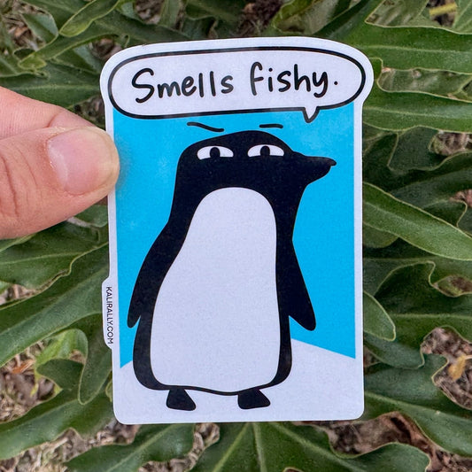 Glossy vinyl water bottle sticker by Kalirally featuring a cartoon penguin with “Smells Fishy,” perfect for laptops, bottles, notebooks, and gifts.