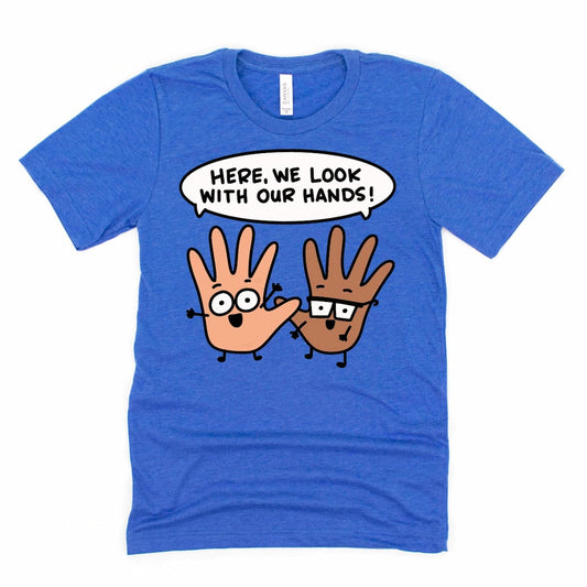 Quirky Parent T Shirt in heather royal blue with bold text “Here we look with our hands,” funny parenting shirt for moms and dads by Kalirally