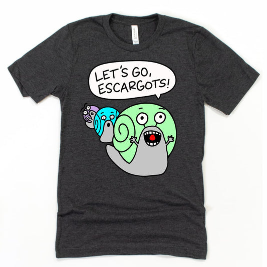 Dark grey escargot pun t shirt with cartoon snails and “Let’s Go, Escargots!” slogan, weird and fun shirt by Kalirally
