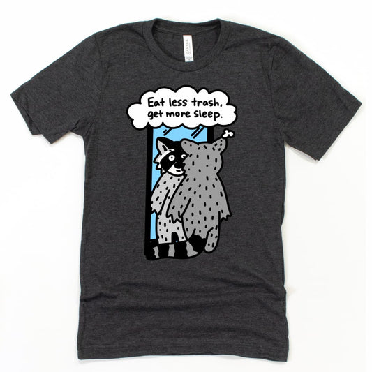Raccoon shirt in Heather Dark Grey with funny cartoon raccoon saying eat less trash, get more sleep, by Kalirally