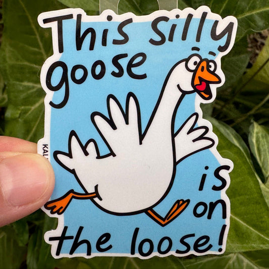 Silly Goose Sticker with cartoon goose and phrase “This silly goose is on the loose!” Funny animal decal by Kalirally