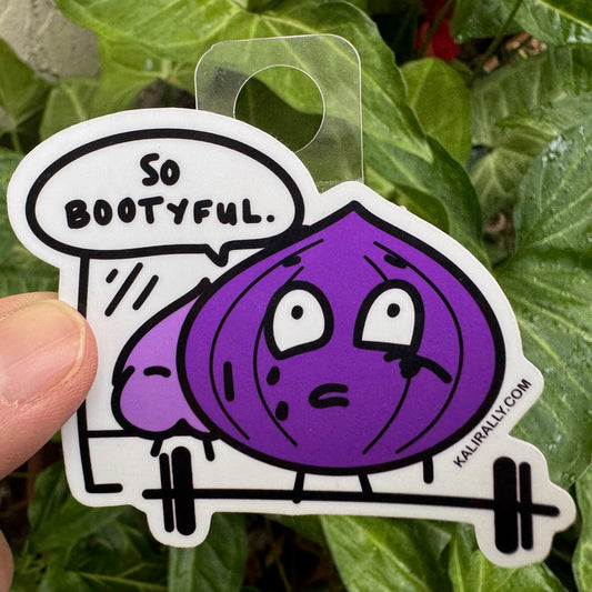 A cute glossy vinyl sticker of a cartoon onion looking in mirror at its onion booty, crying, with “So Bootyful” text. A gym sticker, perfect for water bottles and workout gear, by Kalirally.