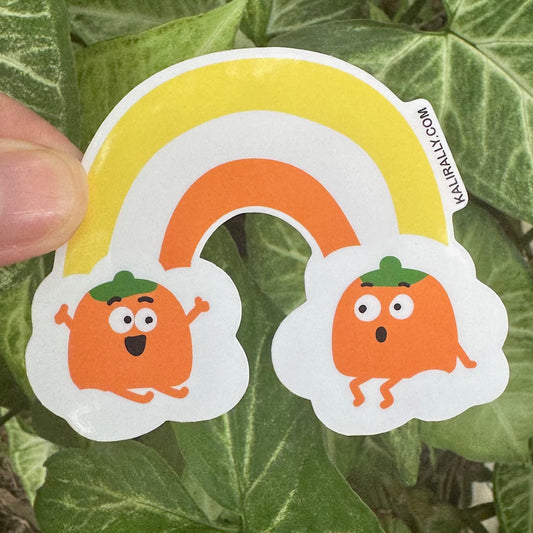 Fun and festive Halloween sticker featuring a candy corn pumpkin design with a rainbow twist, waterproof and UV-protected vinyl by Kalirally.